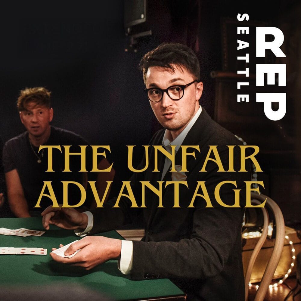 A man in glasses performs a card trick at a table while another man looks on. Text reads "Seattle Rep," "The Unfair Advantage," and "Must List 06-19-2025.