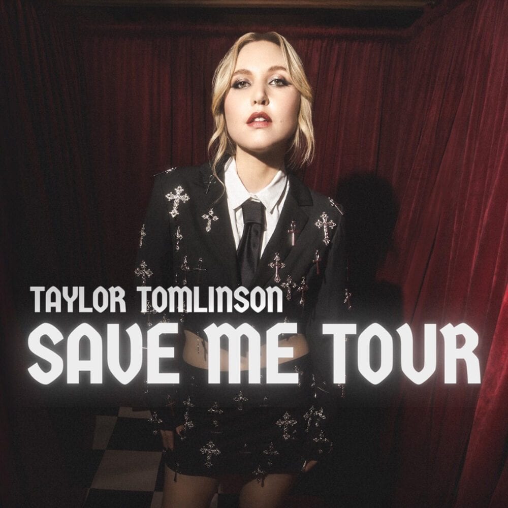 A woman in a black outfit stands in front of red curtains. Text over the image reads "Taylor Tomlinson Save Me Tour – Must List, 09-04-2025.