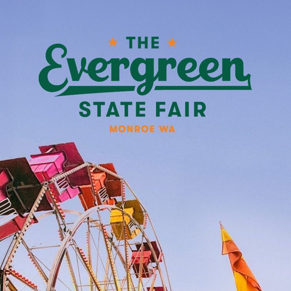 A Ferris wheel and colorful tents with text reading "The Evergreen State Fair Monroe WA" against a clear blue sky—add this 08-21-2025 event to your Must List!.
